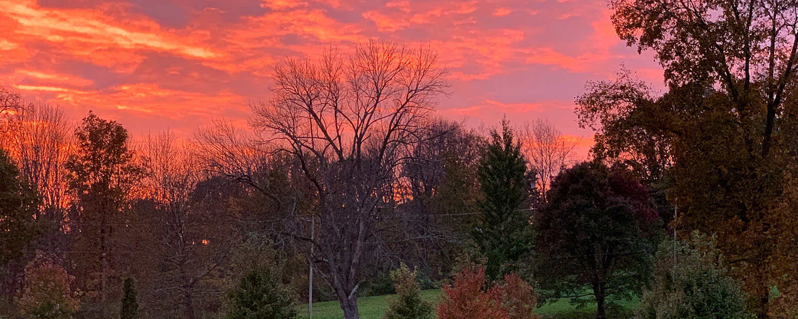 image of sunset in frankford township, county fairgrounds